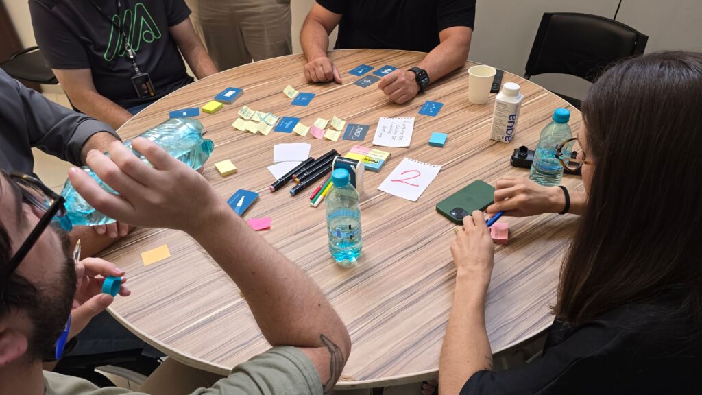 Creative team brainstorming with sticky notes. Cover image for Inspiration As A Discipline Of Brand Leadership.