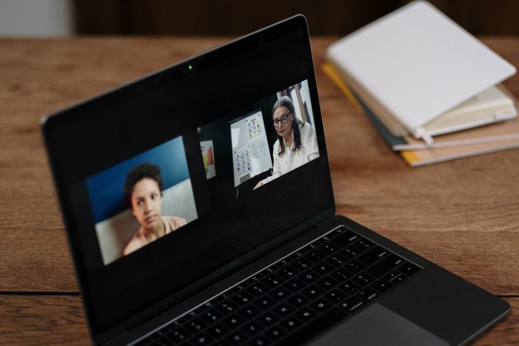 Laptop screen showing a video conference call. Cover image for Redraw the Perimeter of Your Relevance: A CEO and CMO on the Same Call.