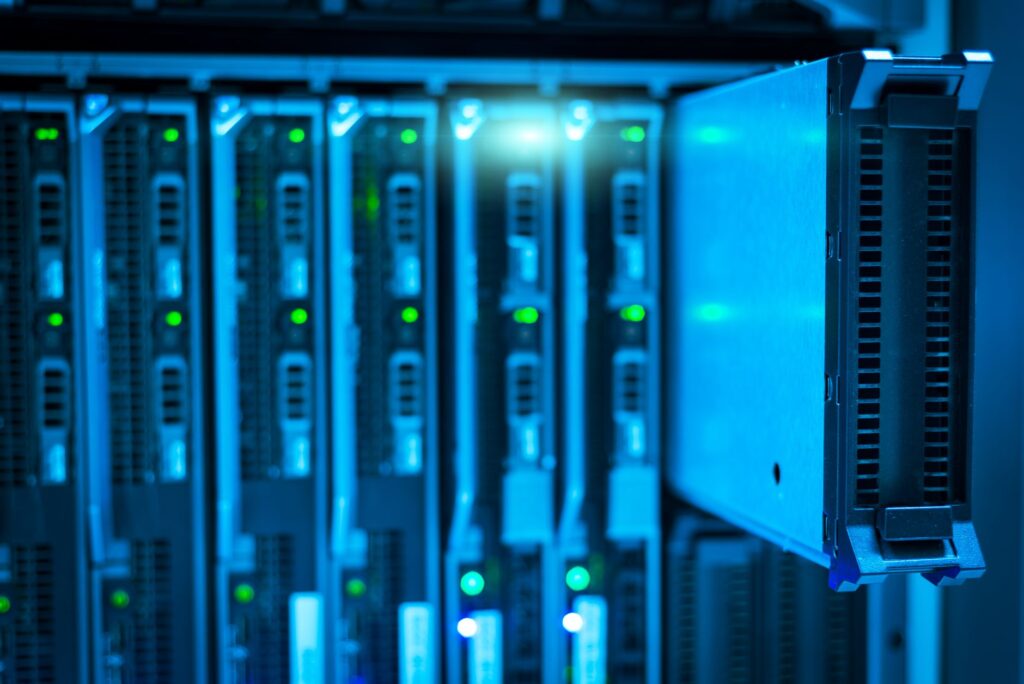 Server room lit with blue light. Cover image for Companies Do Not Have Machine Learning Problems.