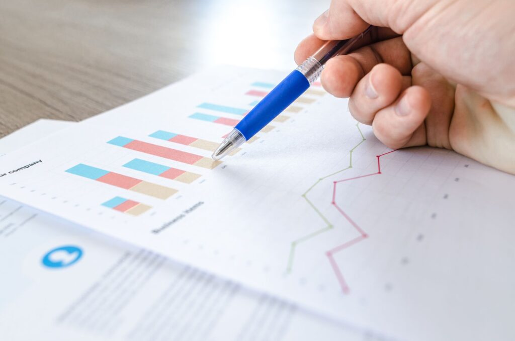 Market research survey forms on a desk. Cover image for What Nielsen Tells You Is What You Told Nielsen.