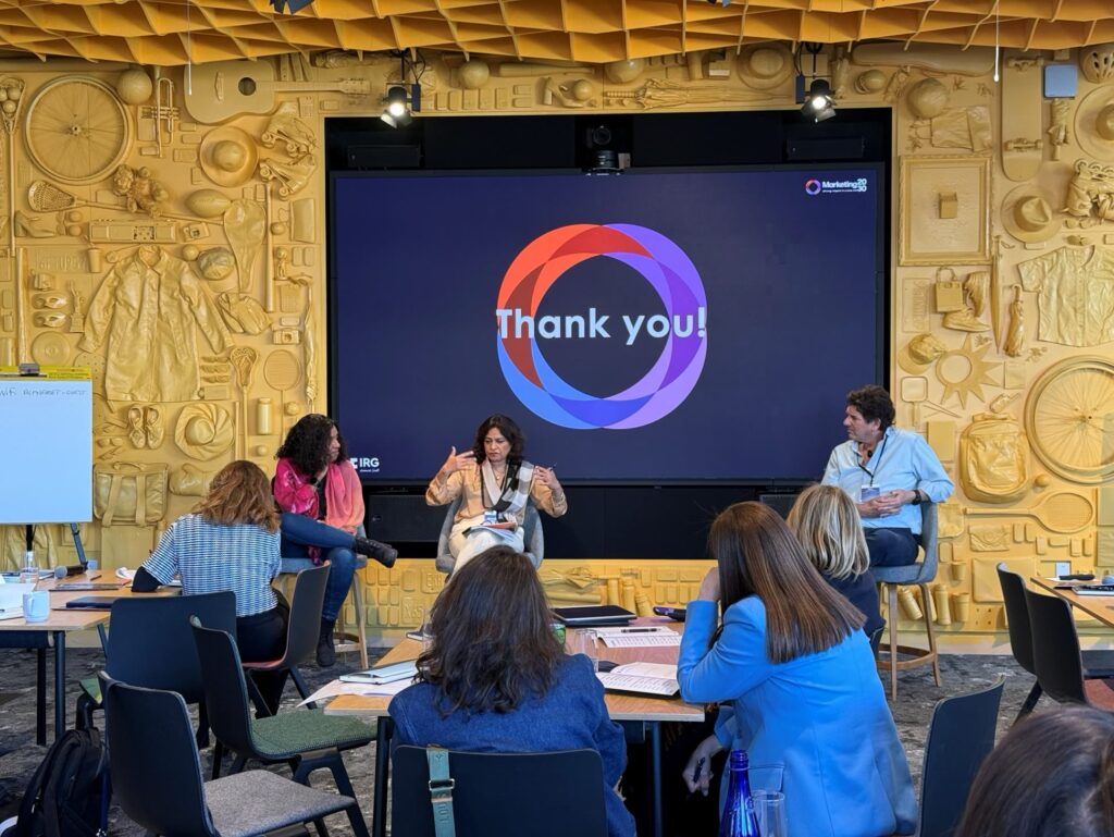 Members of the Marketing2030 Leadership Lab in session, the closing slide of the presentation on the screen behind them.